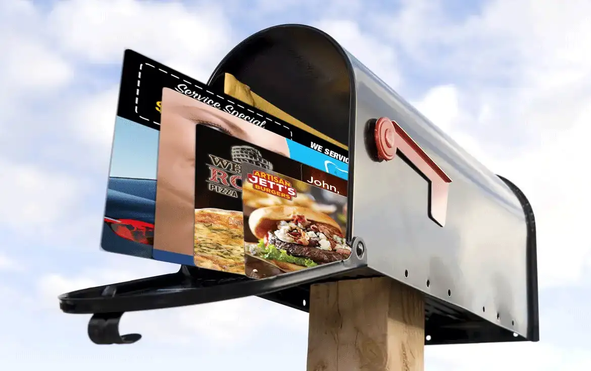 Direct mail postcards arriving in mailboxes as part of a coordinated campaign